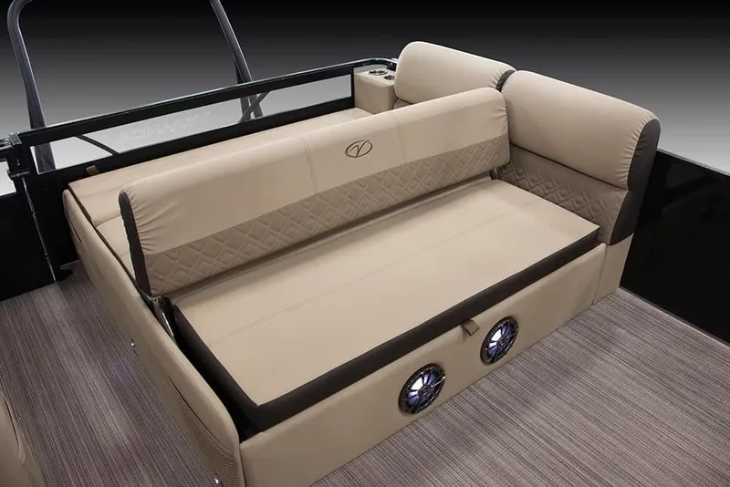 Slide: The Image of 2022 Veranda VP25VLC boat with beige cushioned seating and built-in speakers. - 6
