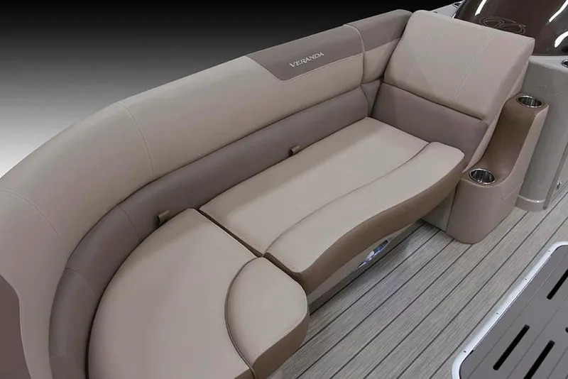 Slide: The Image of 2022 Veranda VR25RC boat with luxurious beige seating. - 2