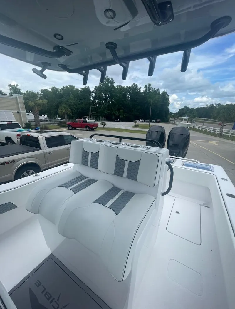 Slide: The Image of 2024 Invincible 33 Open Fisherman boat with dual seats and rod holders. - 7