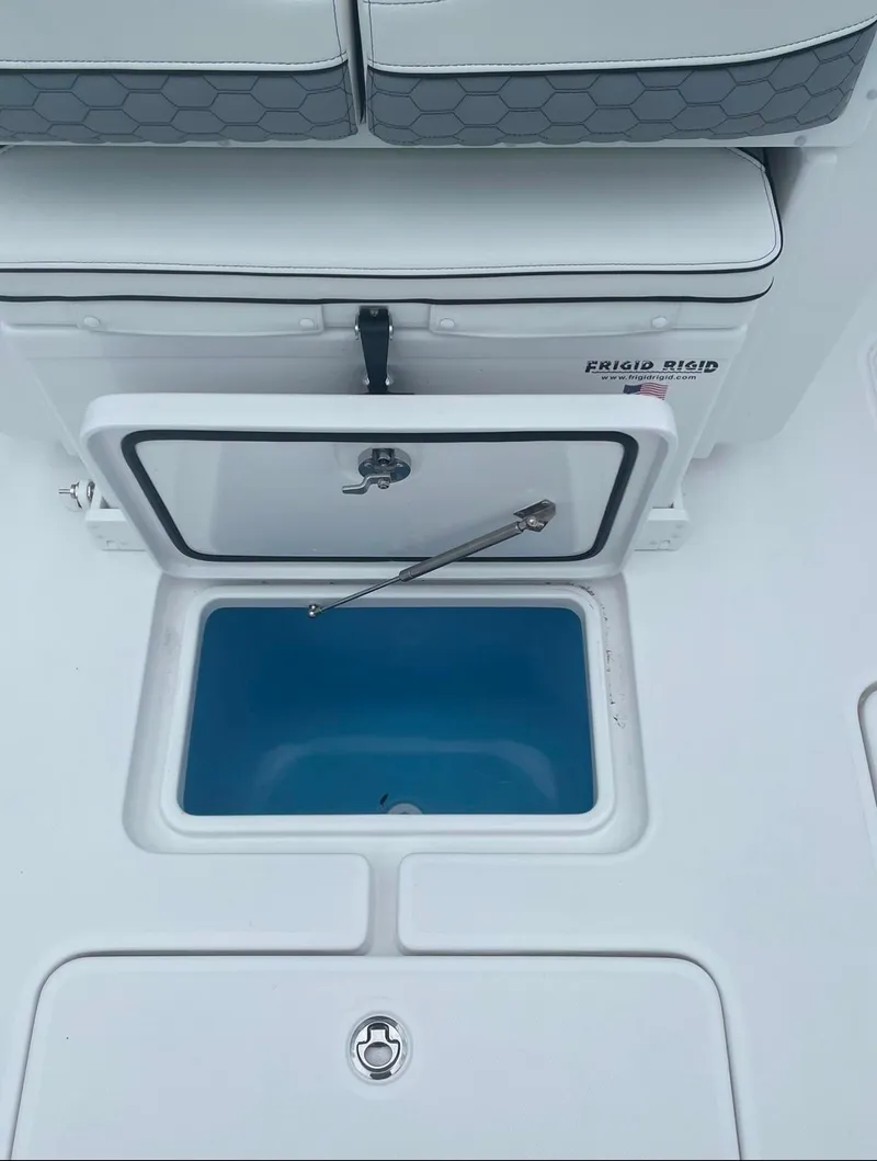 Slide: The Image of 2024 Invincible 33 Open Fisherman livewell with open lid. - 10