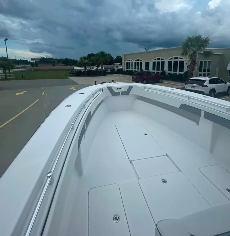 Slide: The Image of 2024 Invincible 33 Open Fisherman boat with spacious deck and sleek design. - 5