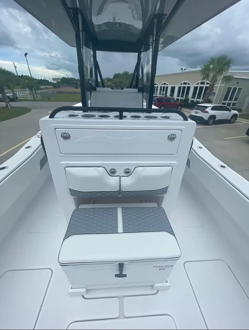 Slide: The Image of 2024 Invincible 33 Open Fisherman boat interior with seating and storage. - 9