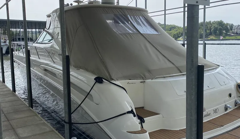 Slide: The Image of 2000 Sea Ray 540 Sundancer yacht docked in a marina. - 8