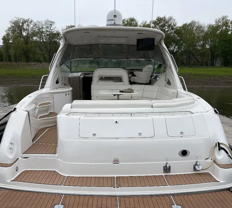 Slide: The Image of 2000 Sea Ray 540 Sundancer yacht with spacious deck and seating area. - 9