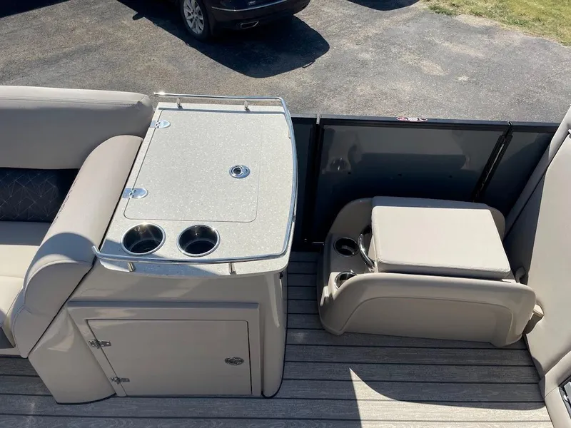 Slide: The Image of 2024 Harris 270 Grand Mariner boat interior with seating and table. - 6