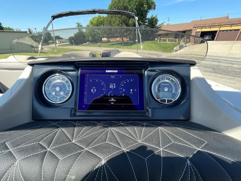 Slide: The Image of Dashboard of 2024 Harris 270 Grand Mariner boat with Simrad display. - 9
