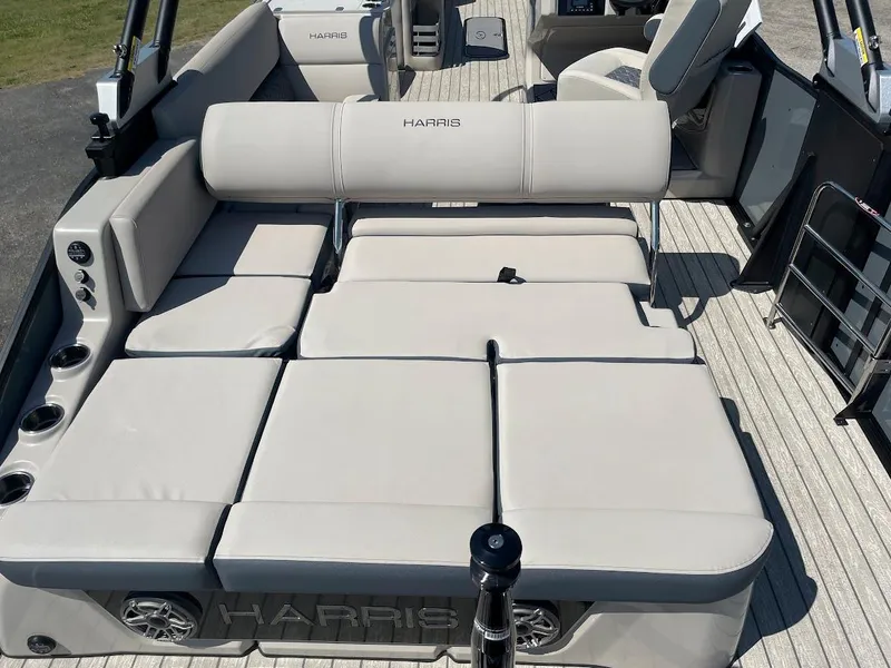 Slide: The Image of 2024 Harris 270 Grand Mariner boat with spacious seating and modern design. - 11