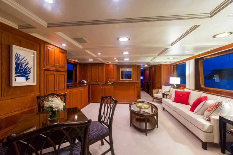 Slide: The Image of Luxurious 1997 Palmer Johnson motor yacht interior with elegant wood paneling and modern furnishings. - 17