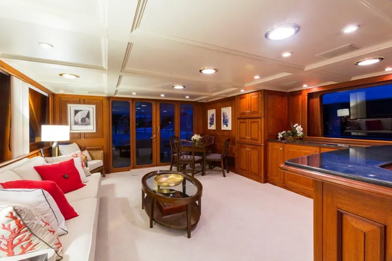 Slide: The Image of Luxurious 1997 Palmer Johnson motor yacht interior with elegant wood paneling and modern furnishings. - 18