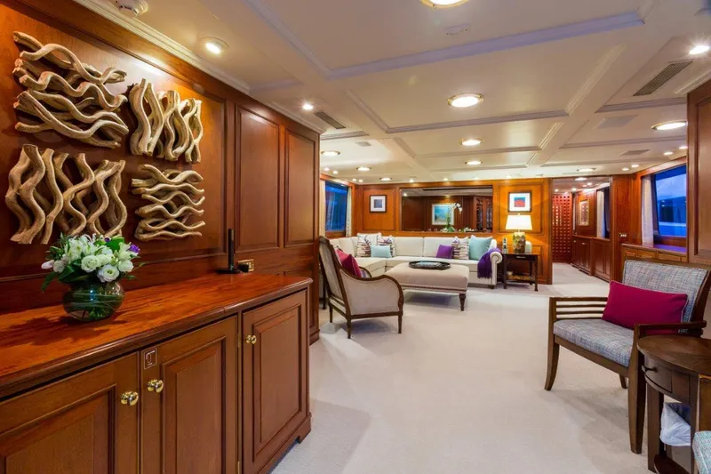 Slide: The Image of Luxurious 1997 Palmer Johnson motor yacht interior with elegant wood paneling and modern decor. - 3