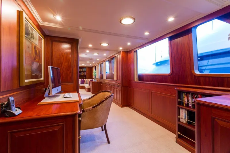 Slide: The Image of Luxurious interior of 1997 Palmer Johnson motor yacht with wood paneling and modern amenities. - 6
