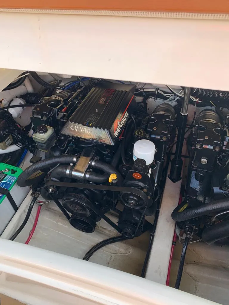 Slide: The Image of Engine compartment of a 1999 Formula 280 Bowrider boat. - 15