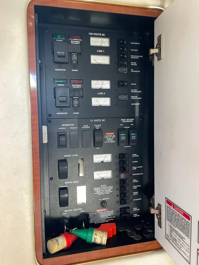 Slide: The Image of Electrical control panel inside a 2002 Sea Ray 340 Sundancer boat. - 17
