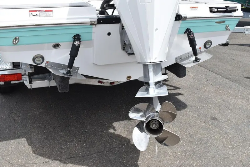 Slide: The Image of 2023 Blackfin 232 DC boat stern with propeller and trim tabs. - 14