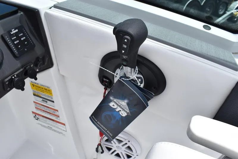 Slide: The Image of 2023 Blackfin 232 DC boat throttle control and dashboard. - 27