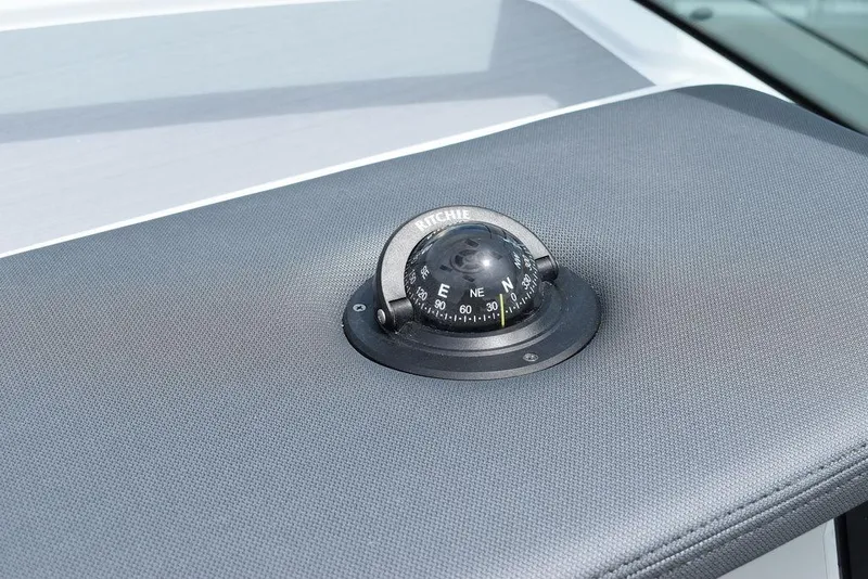 Slide: The Image of 2023 Blackfin 232 DC boat compass on dashboard. - 36