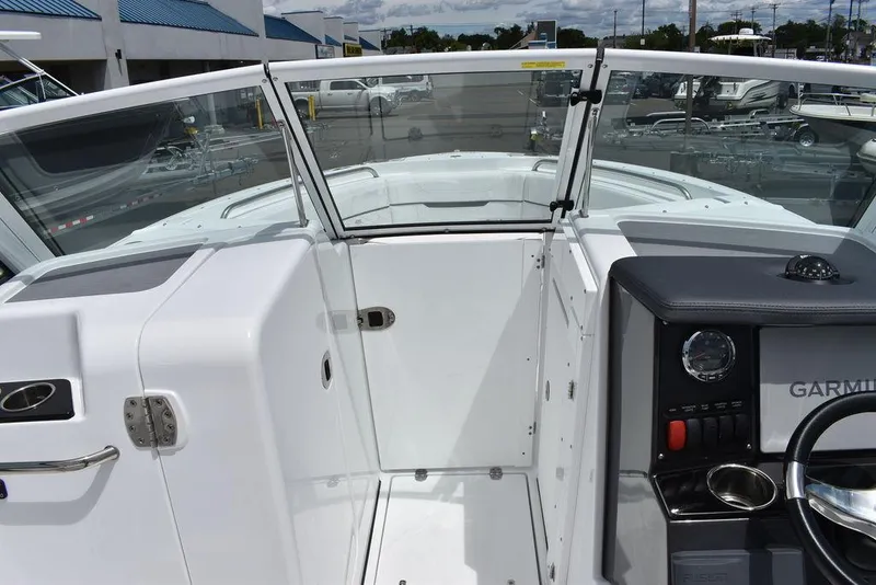Slide: The Image of 2023 Blackfin 232 DC boat interior with windshield and control panel. - 37