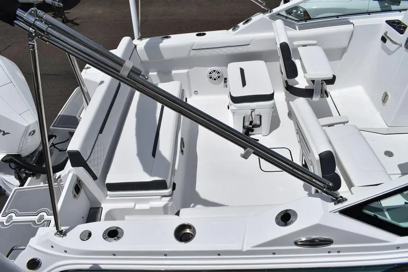 Slide: The Image of 2023 Blackfin 232 DC boat interior with white seating and modern design. - 7