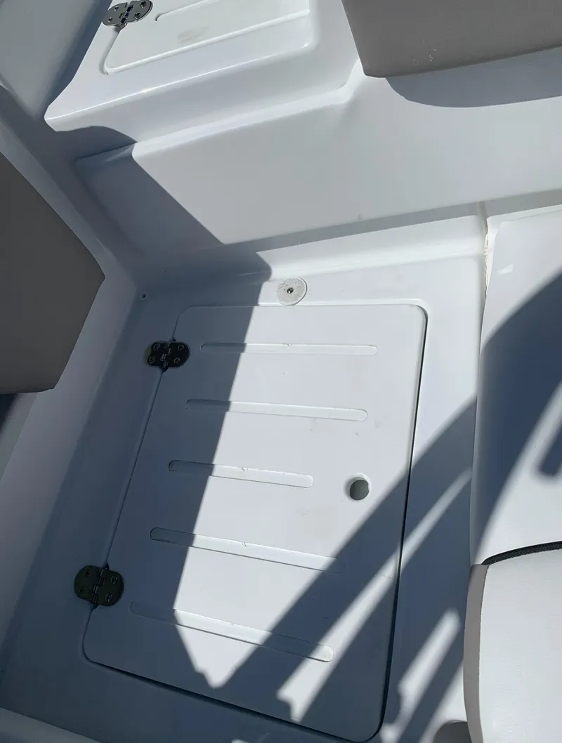 Slide: The Image of 2023 Glastron GTD 245 boat storage compartment. - 21