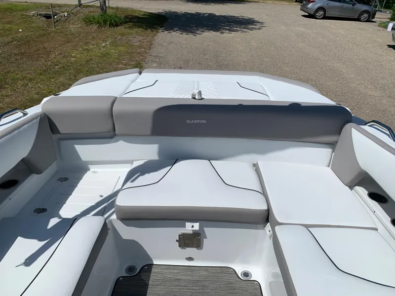 Slide: The Image of 2023 Glastron GTD 245 boat interior with white and gray seating. - 23
