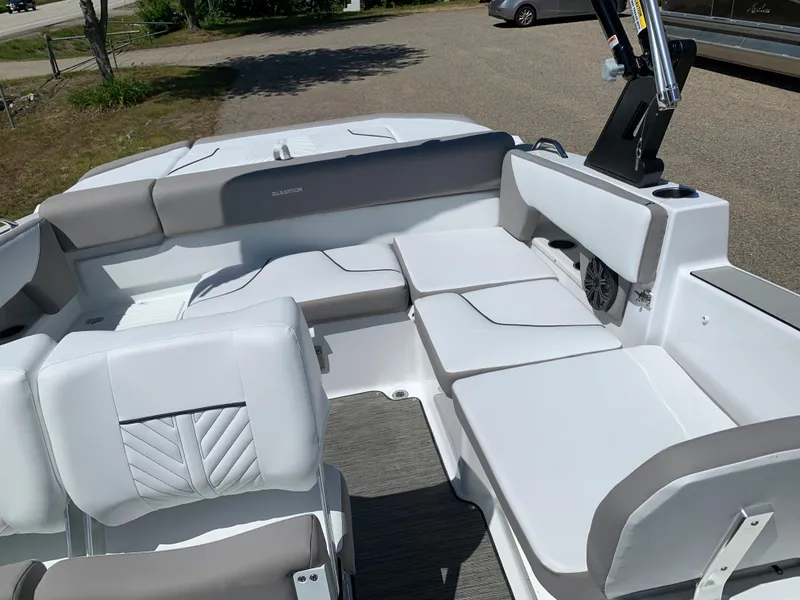 Slide: The Image of 2023 Glastron GTD 245 boat interior with white and gray seating. - 25