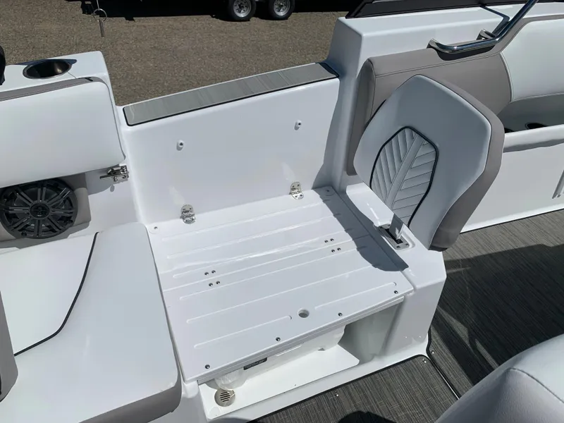Slide: The Image of 2023 Glastron GTD 245 boat interior seating and storage area. - 32