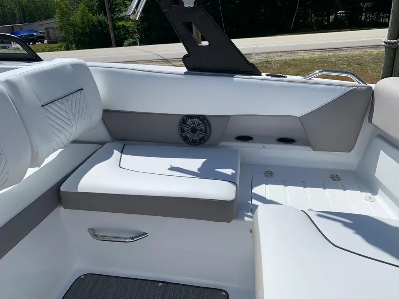 Slide: The Image of 2023 Glastron GTD 245 boat interior with white and gray seating. - 34