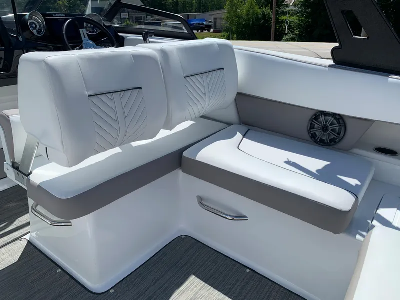 Slide: The Image of 2023 Glastron GTD 245 boat interior with white and gray seating. - 36