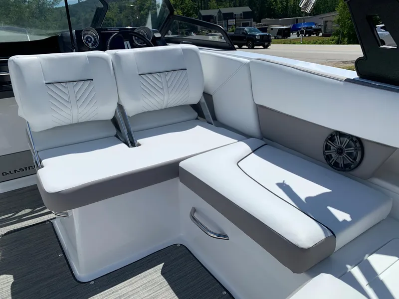 Slide: The Image of 2023 Glastron GTD 245 boat interior with white and gray seating. - 37
