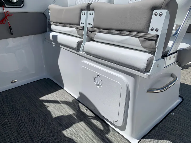 Slide: The Image of 2023 Glastron GTD 245 boat interior seating and storage compartment. - 45