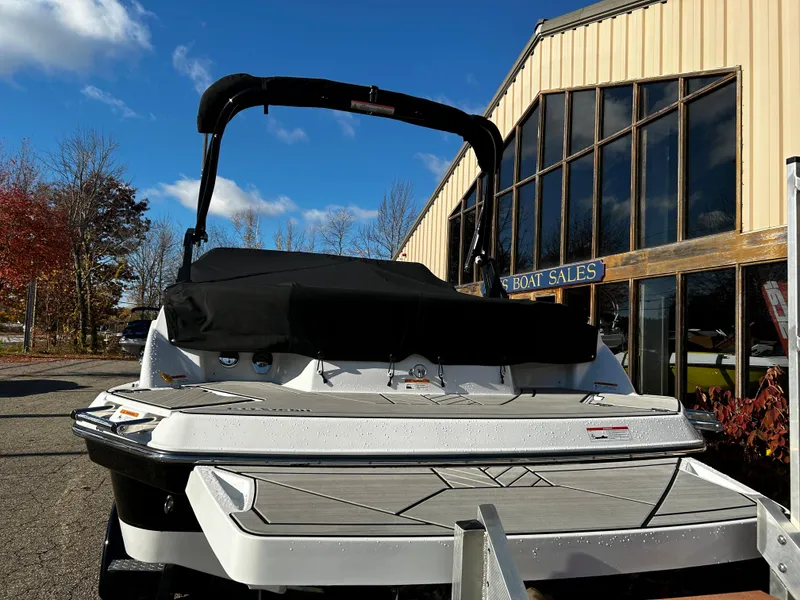 Slide: The Image of 2023 Glastron GTD 245 boat at dealership, rear view. - 6