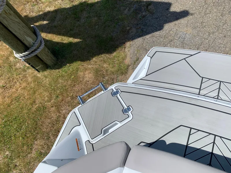 Slide: The Image of 2023 Glastron GTD 245 boat deck with swim platform and ladder. - 8