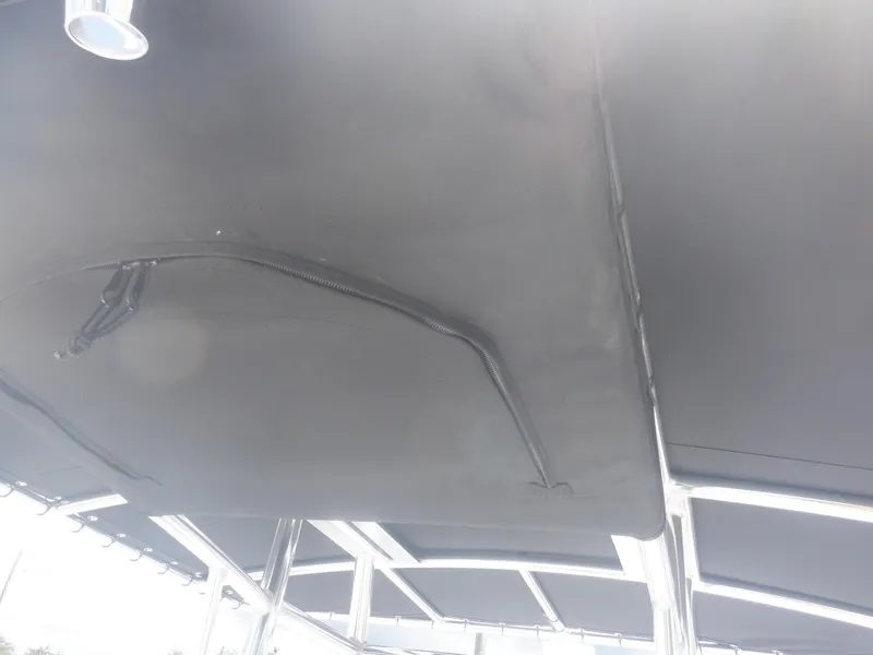 Slide: The Image of 2023 Piranha Casador B2200 boat canopy, black fabric with metal frame. - 12