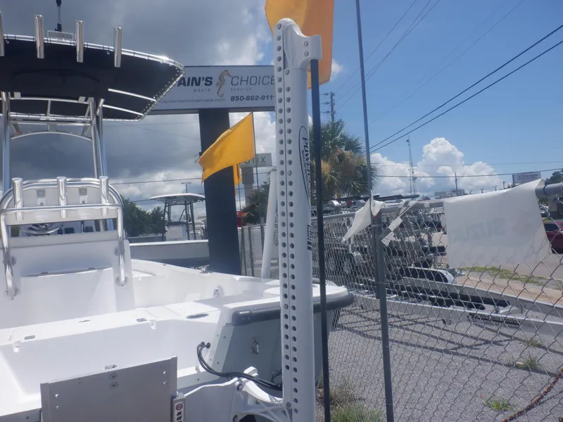 Slide: The Image of Piranha Casador B2200 2023 model boat displayed outdoors at a dealership. - 16