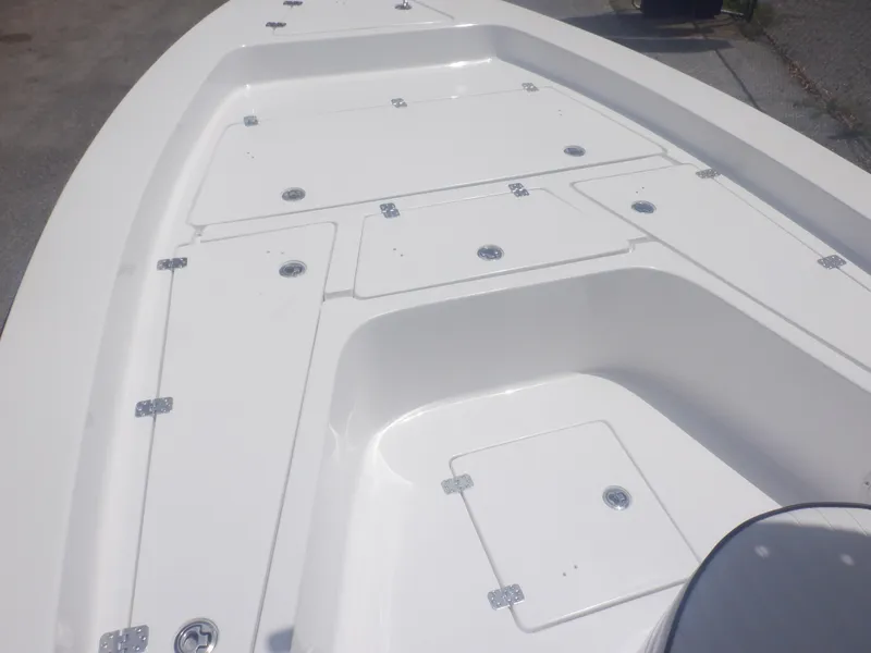 Slide: The Image of 2023 Piranha Casador B2200 boat deck with multiple storage compartments. - 4