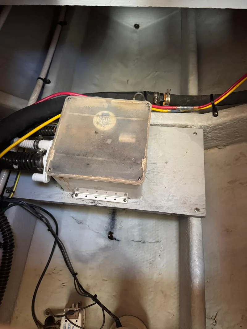 Slide: The Image of Electrical component in a 2003 Silverton 38 Convertible boat's engine compartment. - 33