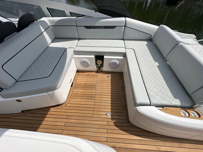 Slide: The Image of Fairline F//Line 33 Outboard 2023 yacht with open outdoor kitchenette on teak deck. - 11