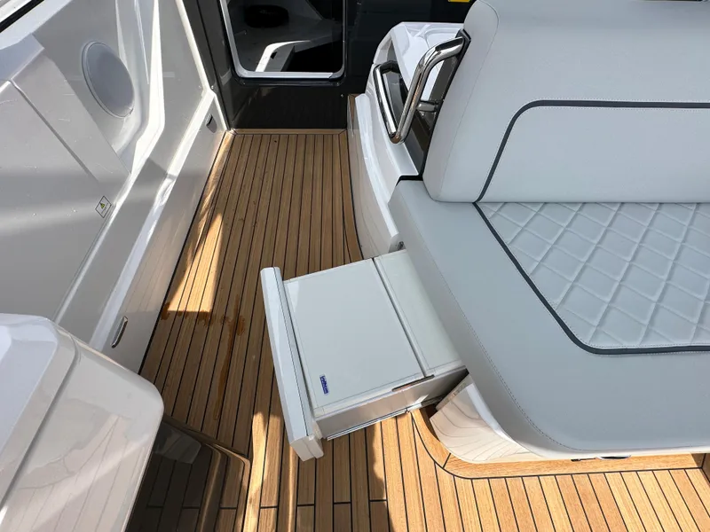 Slide: The Image of 2023 Fairline F//Line 33 Outboard boat interior with ocean view. - 17
