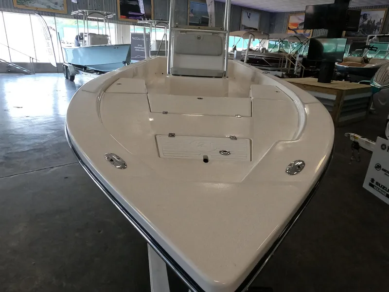 Slide: The Image of 2023 May-Craft 260 Bay boat on display in a showroom. - 10
