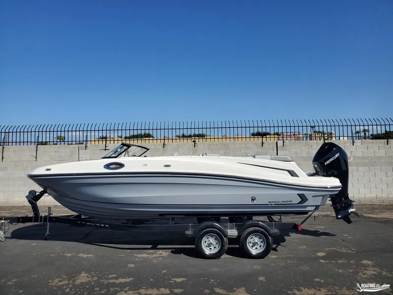 Slide: The Image of 2023 Bayliner VR6 Outboard boat on trailer, parked outdoors. - 3