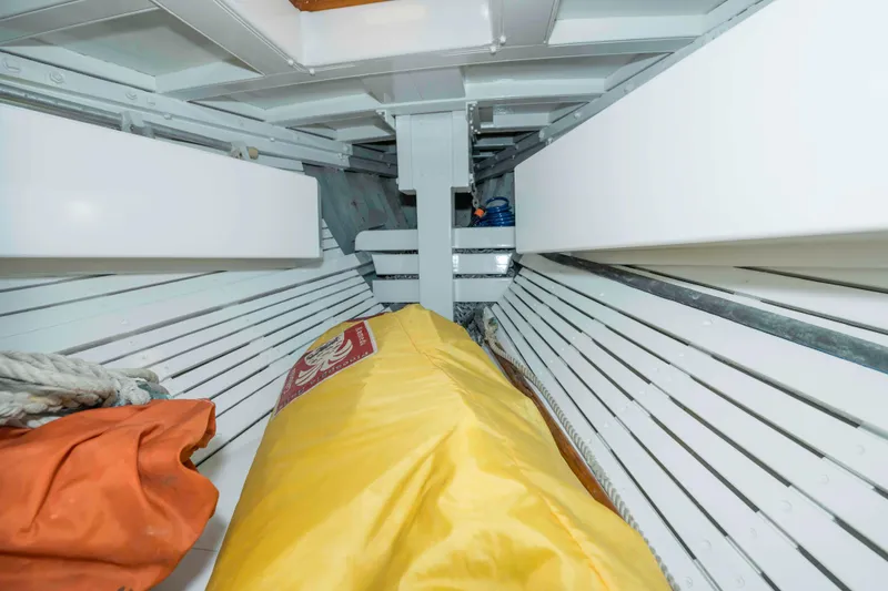 Slide: The Image of Interior of 1927 Schock Staysail Schooner with storage and equipment. - 22