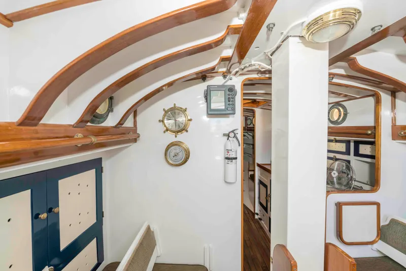 Slide: The Image of Interior of 1927 Schock Staysail Schooner with wooden beams and nautical decor. - 37
