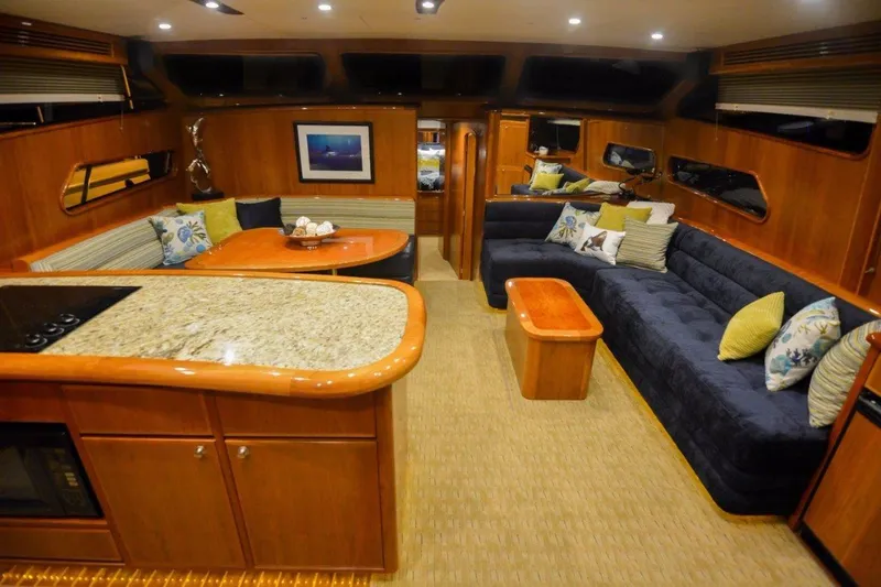 Slide: The Image of Luxurious interior of 2026 Mikelson 50 Generation II Sportfisher yacht with elegant seating and decor. - 3