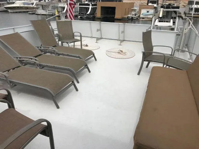 Slide: The Image of Upper deck of 2015 Bravada Why Knot Week 10 with lounge chairs and seating. - 25