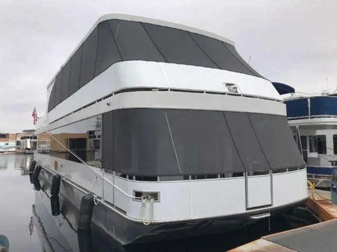 Slide: The Image of 2015 Bravada Why Knot Week 10 houseboat docked at marina. - 7