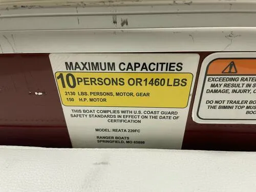 Slide: The Image of 2019 Ranger 220FC boat capacity label: 10 persons or 1460 lbs, 2130 lbs with gear, 150 HP - 10