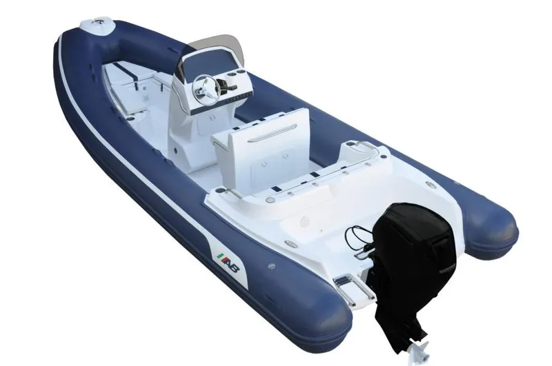 Slide: The Image of 2024 AB Inflatables 21 VST boat with outboard motor and steering console. - 2