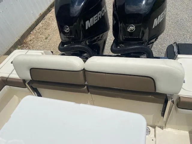 Slide: The Image of 2014 ShearWater 26 Carolina boat with twin Mercury outboard engines. - 14