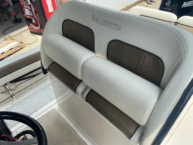 Slide: The Image of 2014 ShearWater 26 Carolina boat seating with ShearWater logo. - 15