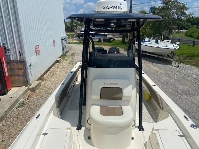 Slide: The Image of 2014 ShearWater 26 Carolina boat with Garmin navigation system. - 24
